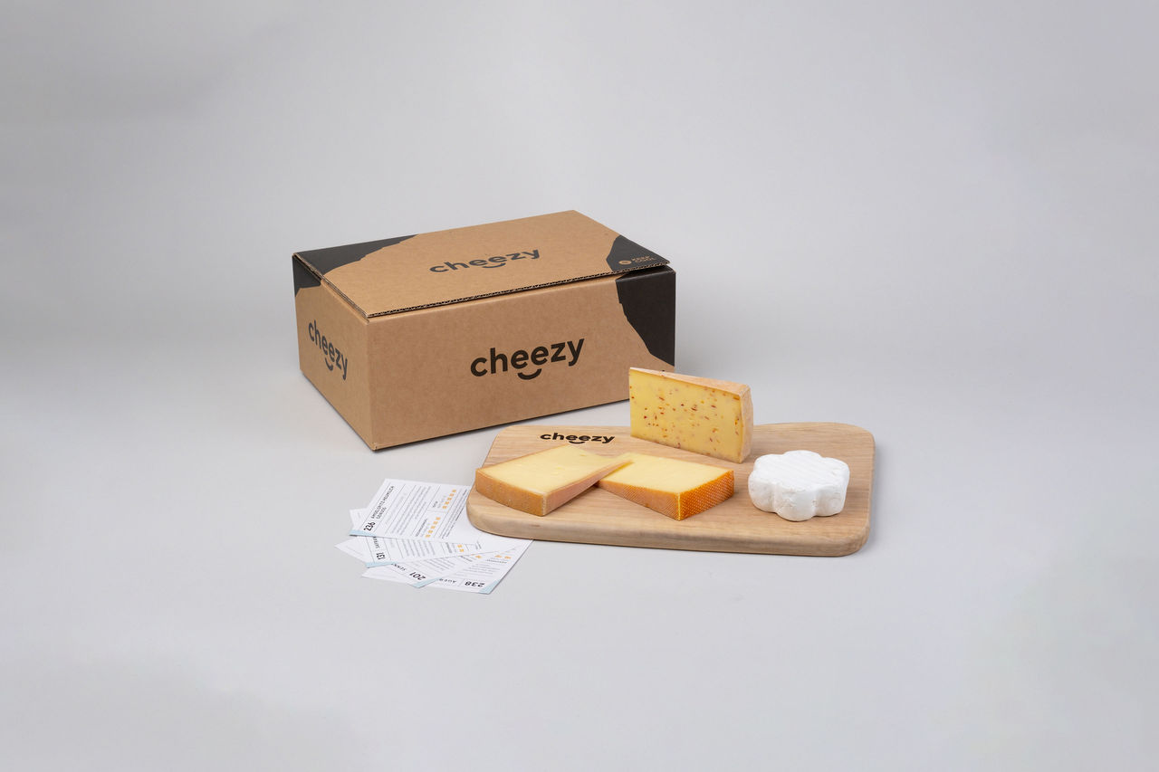a cheezy delivery box and cheese